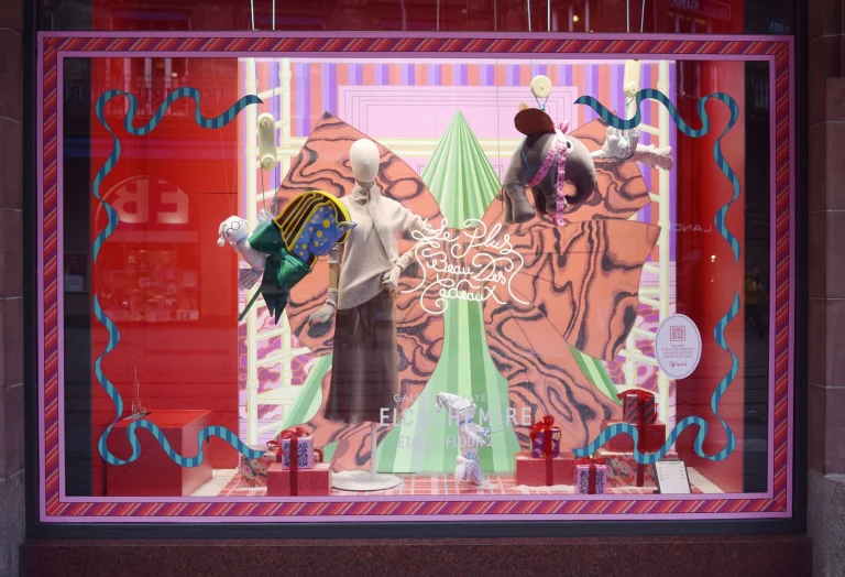 Colorful Strasbourg window display featuring mannequins and holiday decor. Perfect for festive and retail themes — an editorial image for "The New Wave Movement and Its Pop Crossover."