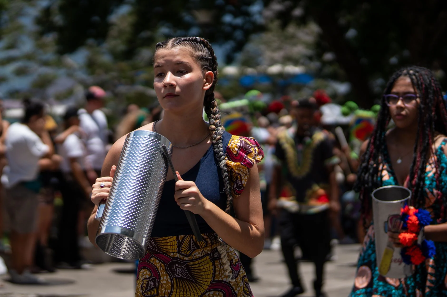 Vibrant festival celebration with musicians in traditional attire, San José, Costa Rica — an editorial image for "Reggae and the Globalization of Jamaican Music."