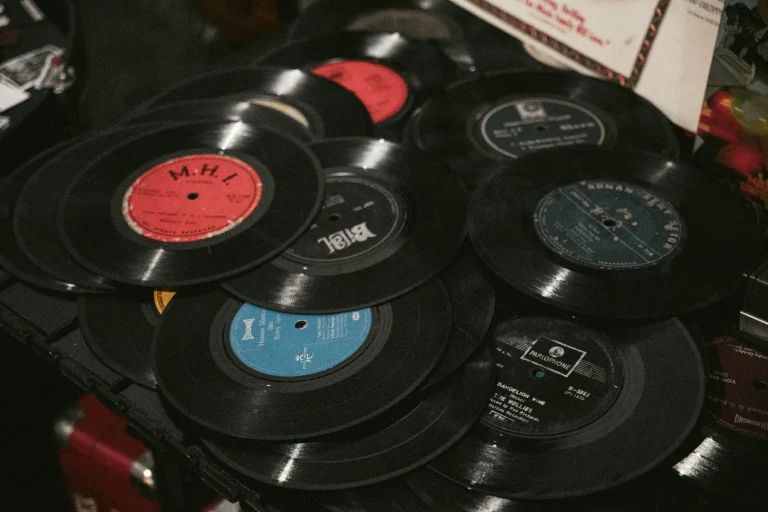 A vintage collection of vinyl records, showcasing iconic labels and retro aesthetics, perfect for music enthusiasts — an editorial image for "Sampling, Remix Culture, and the Changing Idea of Originality."